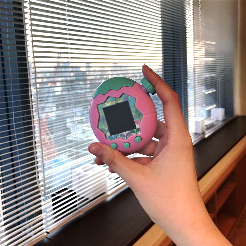 A picture of a Paradise device held in hand